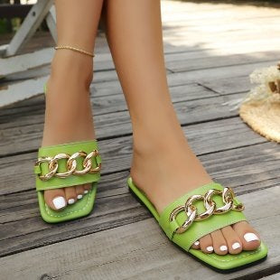 Damen Elegante und bequeme Slides mit dekorativen Metallakzenten