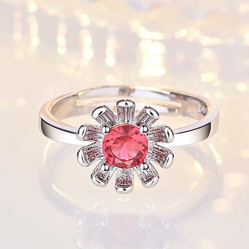 Damenring mit funkelndem rotem Edelstein und floralem Design Shop Nory