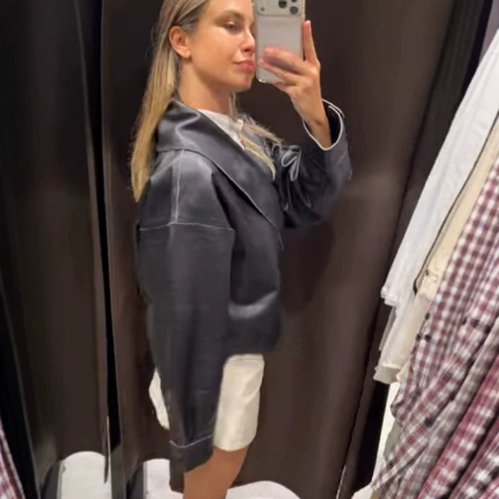Damen Kurzjacke aus Kunstleder mit seitlicher Schnallen-Taille und voluminösen Raglanärmeln Shop Nory