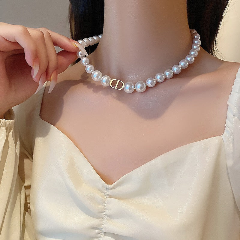 Damen elegante Perlenhalskette mit modischem Verschluss Shop Nory