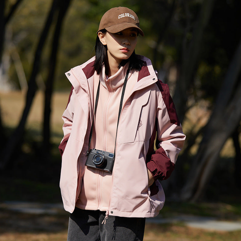 Damen zweilagige wasserabweisende Outdoorjacke mit Kapuze, Taillenregulierung und Kontrastbesätzen Shop Nory