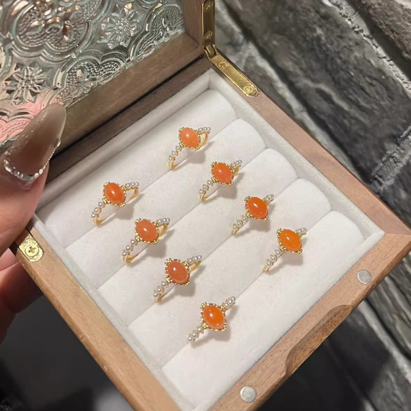 Damenring mit ovalem Rosenquarz und filigranem Golddesign Shop Nory