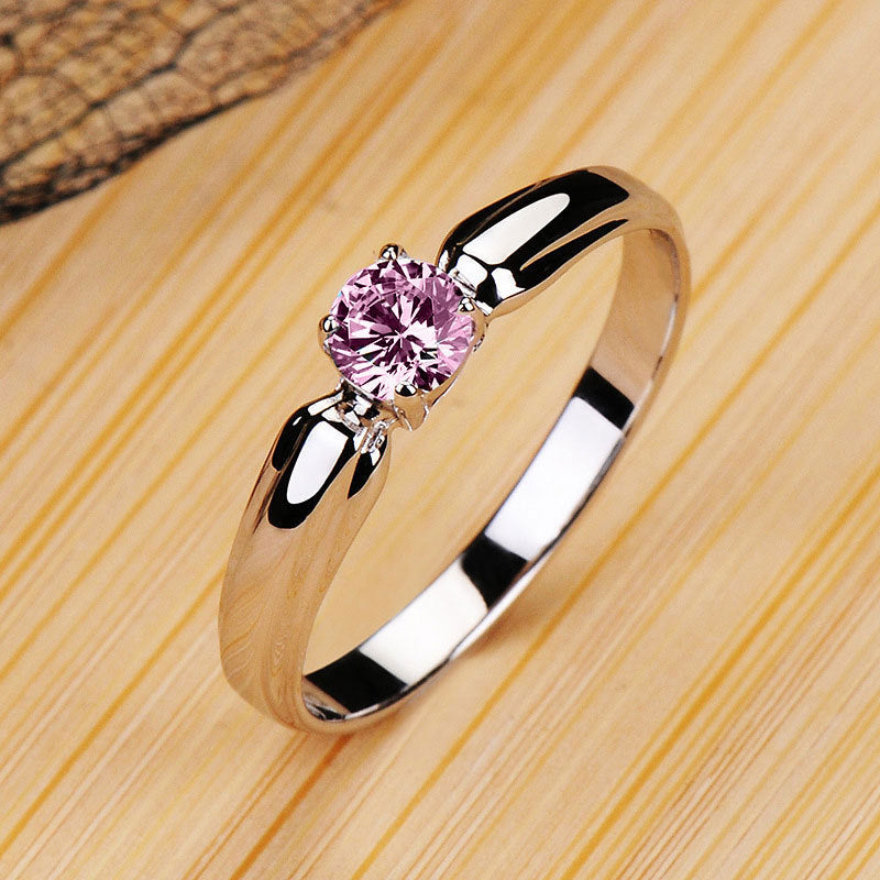 Damen Verlobungsring mit funkelndem Zirkonia und geschwungenem Band Shop Nory