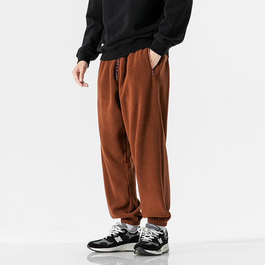 Herren Weit geschnittene Fleece-Jogginghose mit elastischen Bündchen und Eingrifftaschen Shop Nory