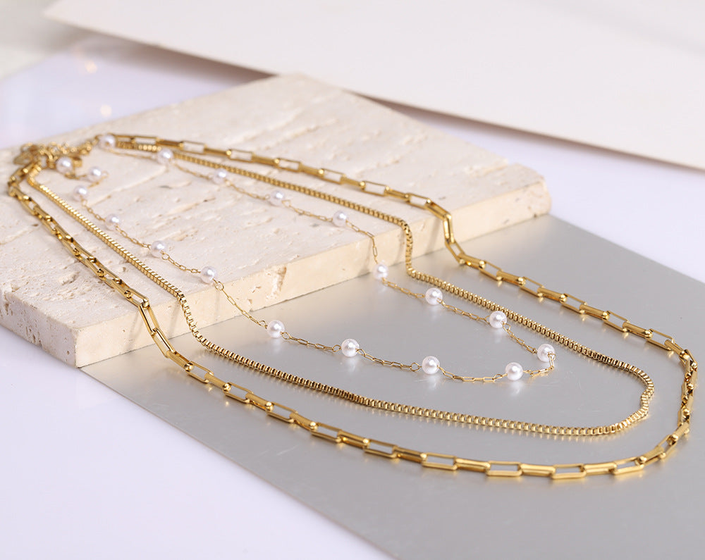 Damen Halskette mit modernen Gliederelementen und Perlenakzenten Shop Nory