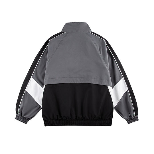 Unisex Kastig geschnittene Trackjacke im Retro-Sportstil mit hohem Stehkragen, Farbblock‑Einsätzen und elastischem Saum Shop Nory