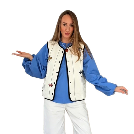 Damen Steppweste mit Stickmotiven, kontrastierter Paspel und Druckknopfverschluss Shop Nory