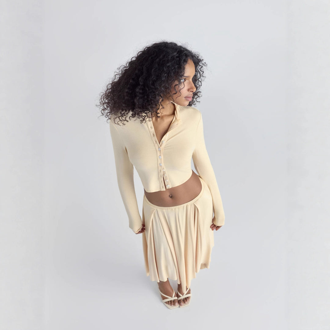 Damen Cropped-Cardigan mit Perlmuttknöpfen und asymmetrischem Zipfel-Midirock Shop Nory