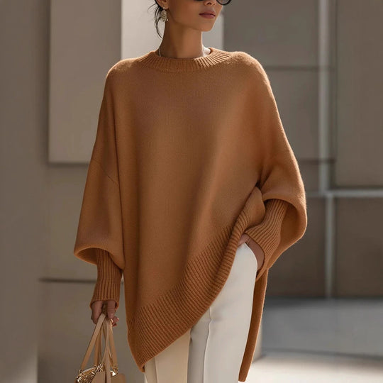 Damen nan Oversize Strickponcho mit asymmetrischem Saum und gerippten Ärmeln Shop Nory