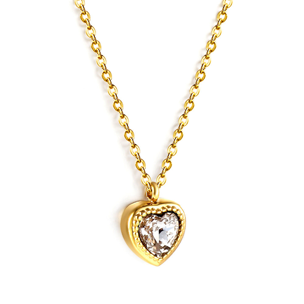 Damen Halskette mit herzförmigem Anhänger aus goldplattiertem Edelstahl und funkelndem Zirkonia Shop Nory