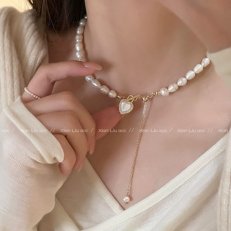 Damen Halskette mit elegantem Perlenanhänger und charmanten Herzdetails Shop Nory
