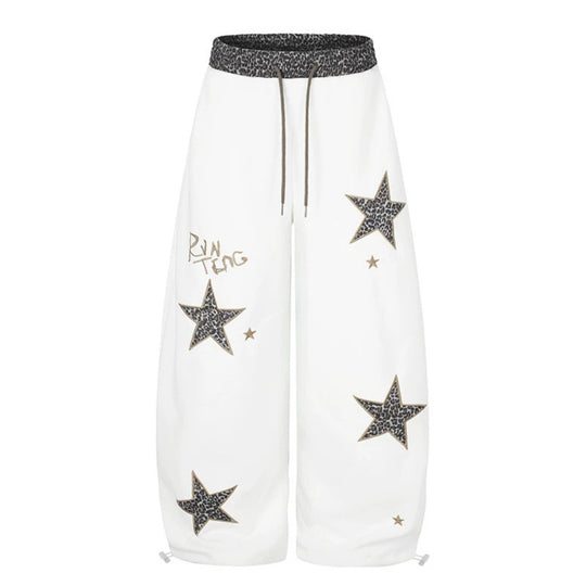 Damen Extraweite Palazzo‑Sweathose mit Leo‑Taille, Stern‑Applikationen und Kordelzug Shop Nory