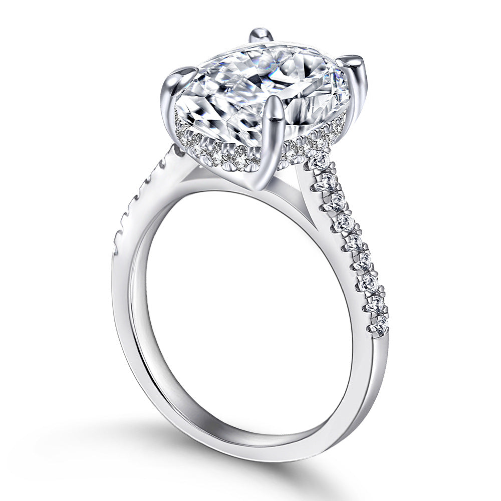 Damen eleganter Ring mit ovalem Hauptstein und feinem Zirkonia-Besatz Shop Nory