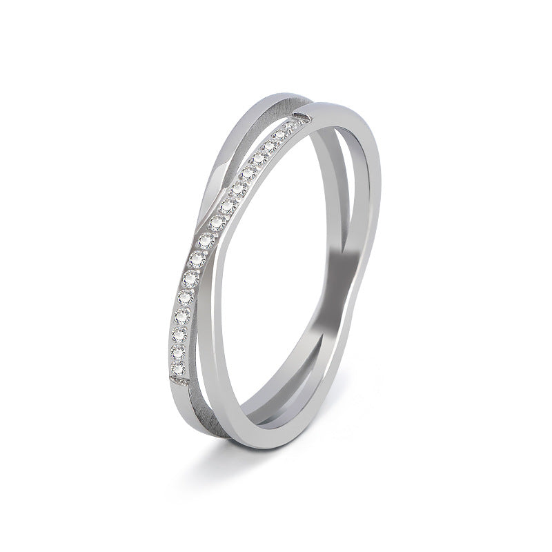 Damen eleganter Ring mit geflochtenem Design und funkelnden Zirkonia-Steinen Shop Nory