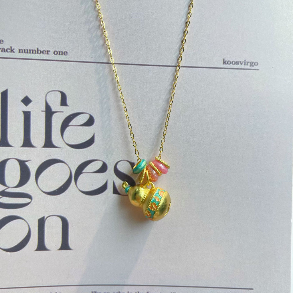 Damen auffällige Halskette mit kunstvollem Glöckchen-Anhänger und bunten Akzenten Shop Nory