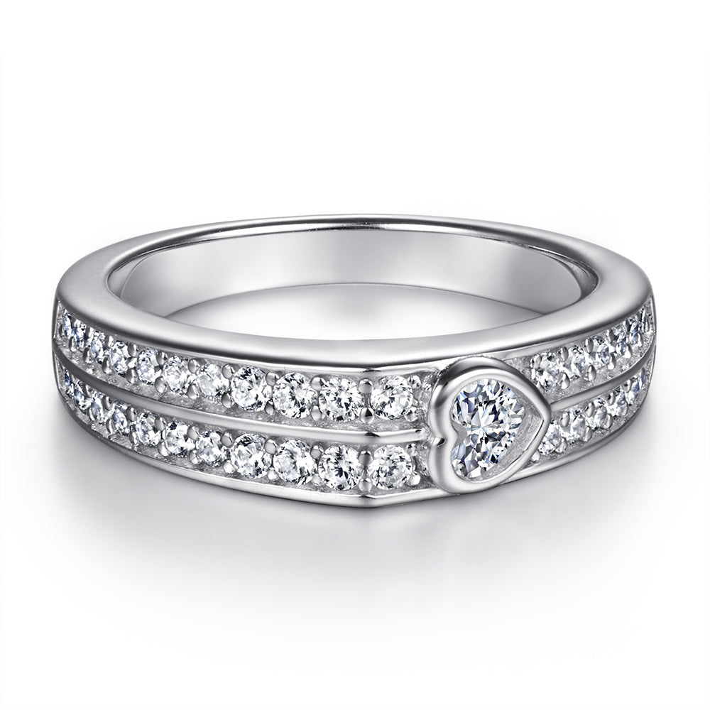 Damen Verlobungsring mit strahlendem Hauptstein und eleganter Zirkonia-Verzierung Shop Nory