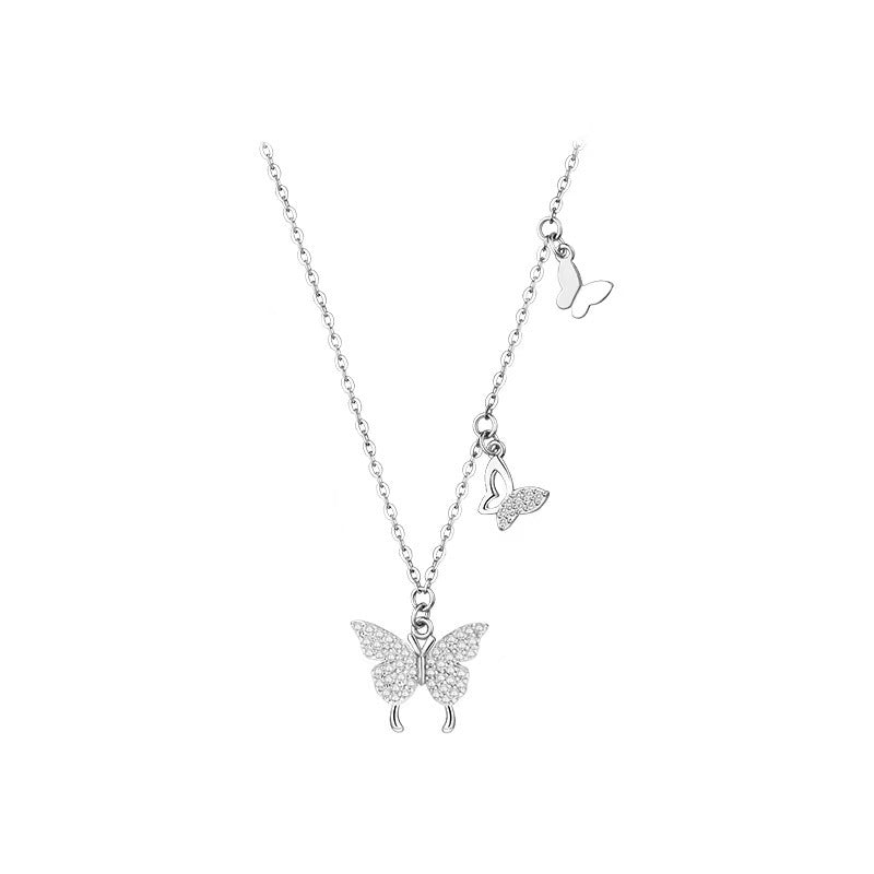 Damen Halskette mit filigranem Schmetterlingsdesign und funkelnden Zirkonia Shop Nory