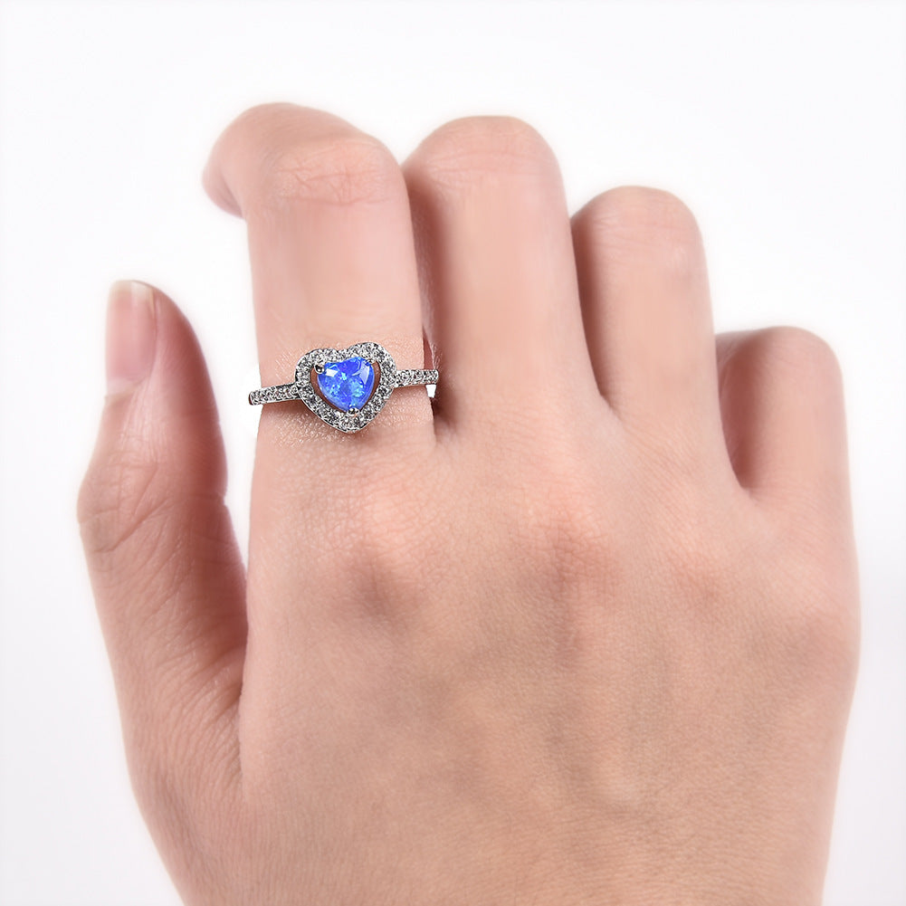 Damen Ring mit herzförmigem Opal und funkelnden Zirkonia-Verzierungen Shop Nory