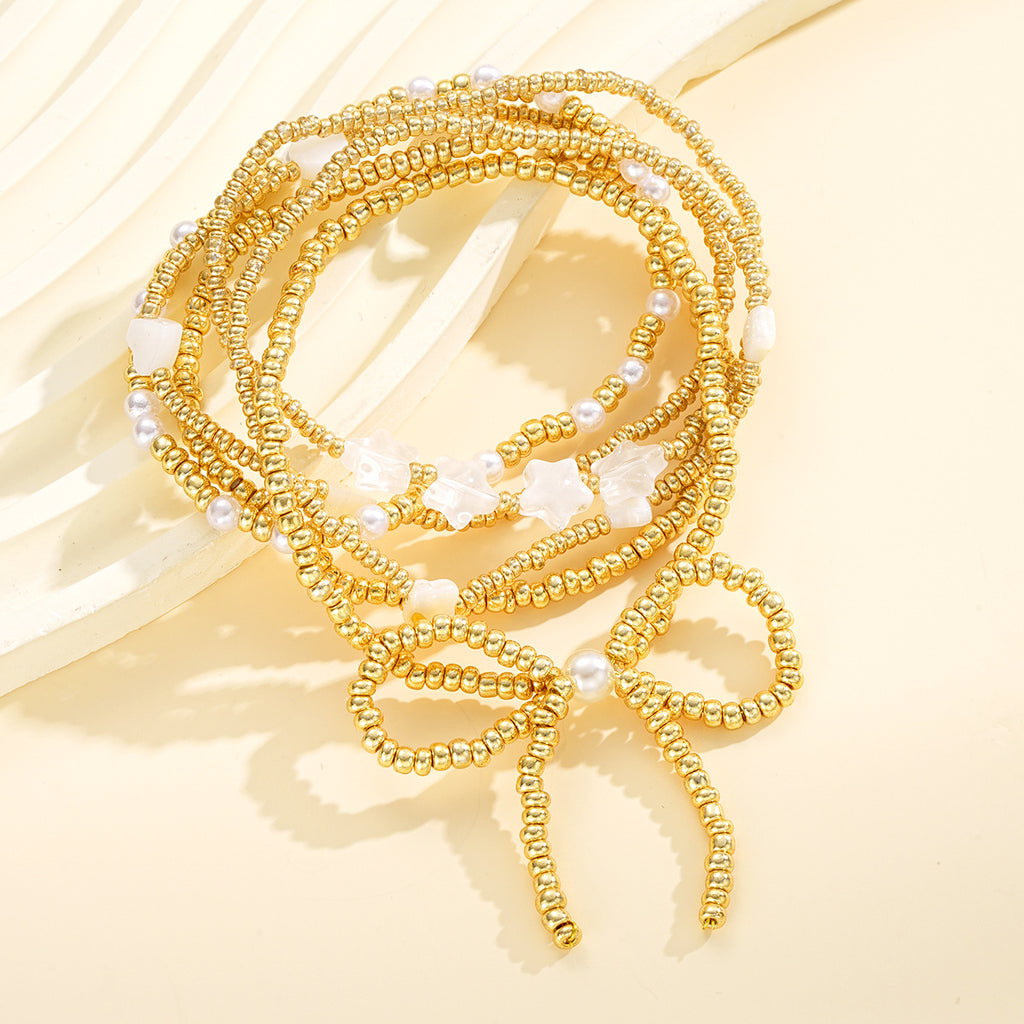 Damen Armreif-Set mit kreativen Perlen und zarten Sternenmotiven Shop Nory