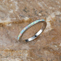 Damen Ring mit schimmerndem Opal und eleganter Edelstahlfassung Shop Nory