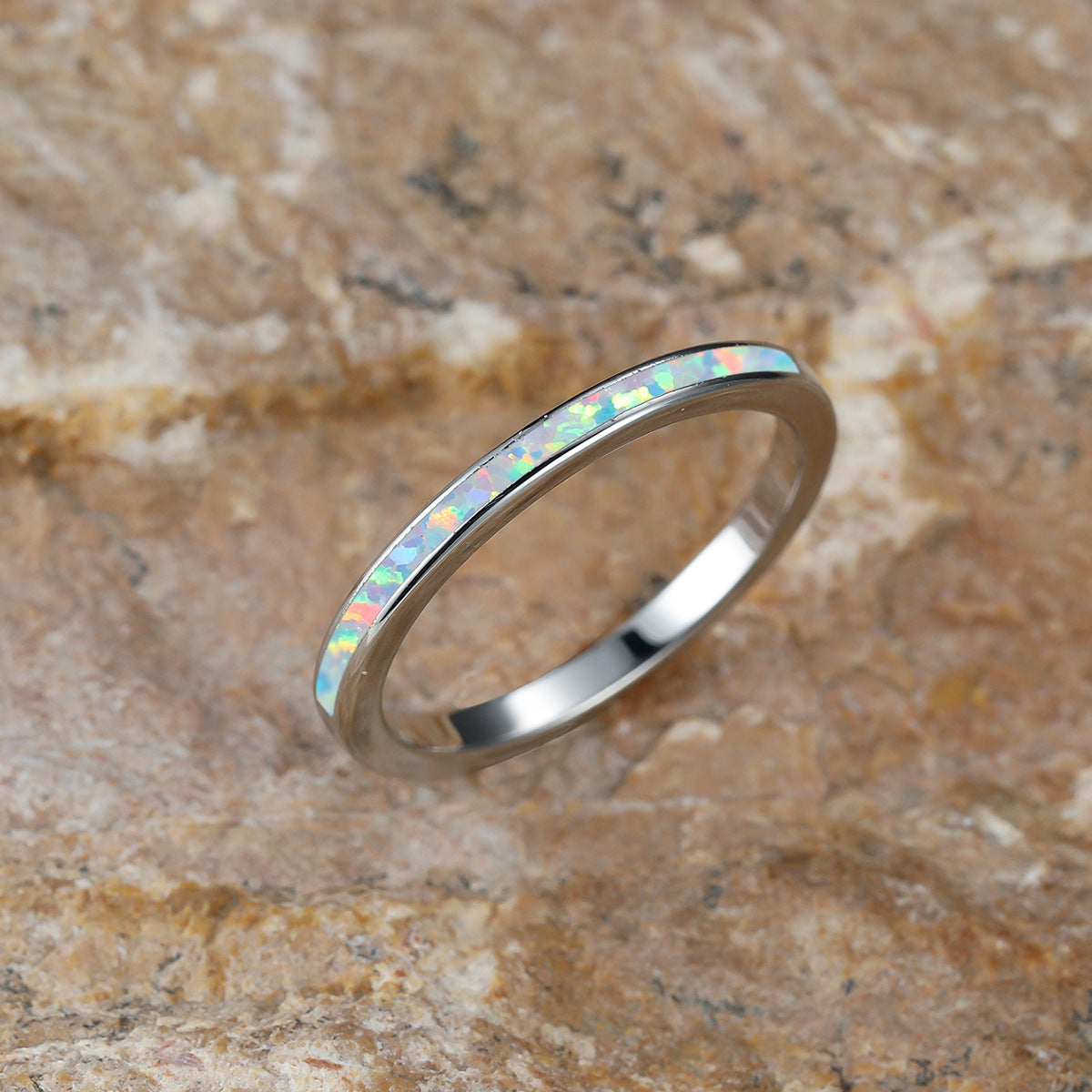 Damen Ring mit schimmerndem Opal und eleganter Edelstahlfassung Shop Nory