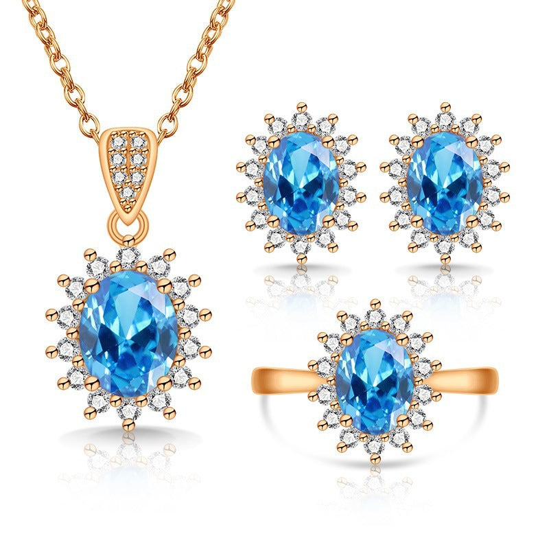 Oval facettiertes Edelstein-Halo-Pendant mit passenden Halo-Ohrringen und verstellbarem Cocktailring-Set