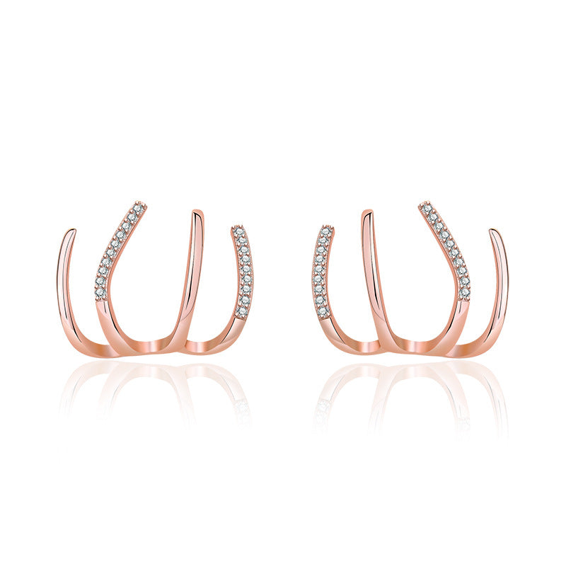 Damen Ohrringe mit kunstvollem Wellen-Design und funkelnden Zirkonia Shop Nory