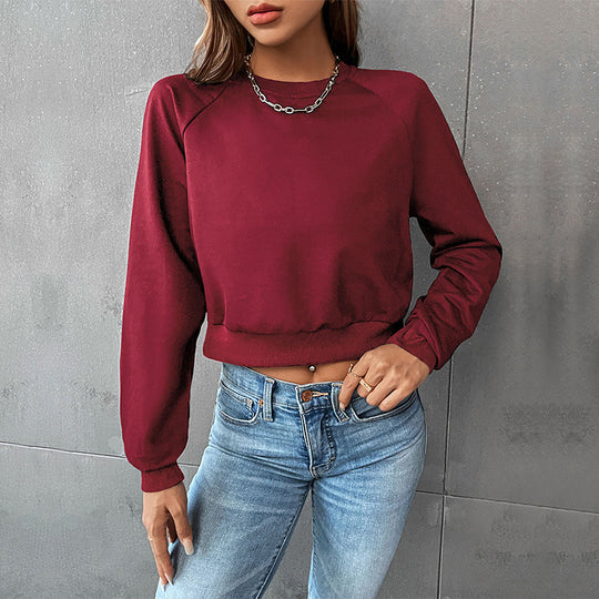 Damen Kurzes minimalistisches Sweatshirt mit Raglanärmeln und geripptem Saum Shop Nory