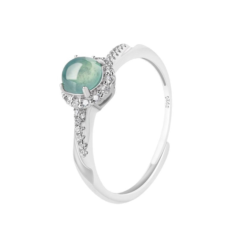 Damen eleganter Ring mit aquamarinfarbenem Stein und funkelnden Zirkonia Shop Nory