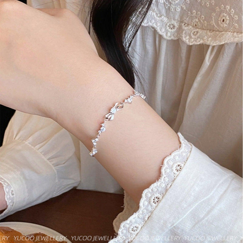 Damen elegantes Zirkonia-Armband mit kunstvollem Design und verstellbarem Verschluss Shop Nory