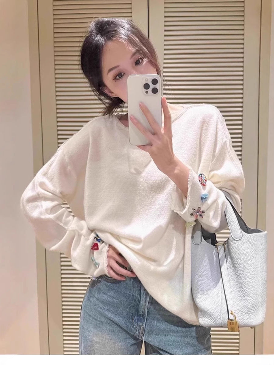 Damen Oversize-Feinstrickpullover mit schmuckbesetzten Ärmelabschlüssen Shop Nory