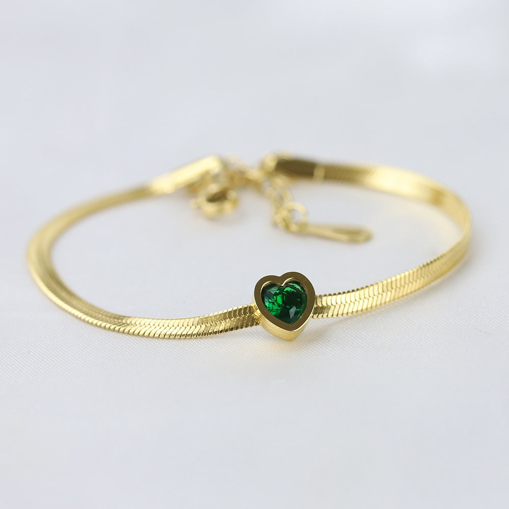 Damen Armband mit grünem Herz-Anhänger und elegantem Drahtdesign Shop Nory