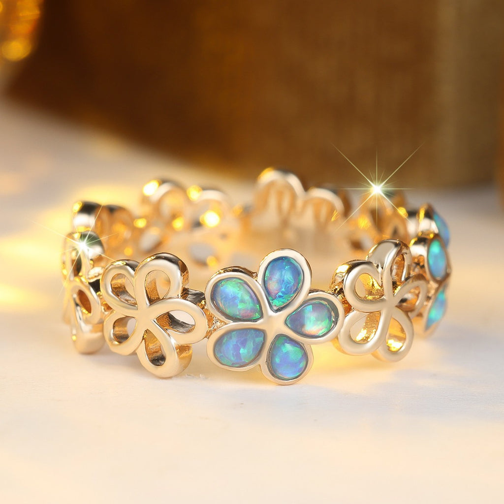 Damen Ring mit floralen, leuchtenden Opaleinsätzen Shop Nory