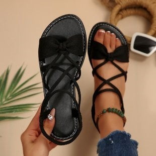 Damen Zarte Römersandalen mit Schleifen-Detail und verstellbaren Schnürriemen Shop Nory