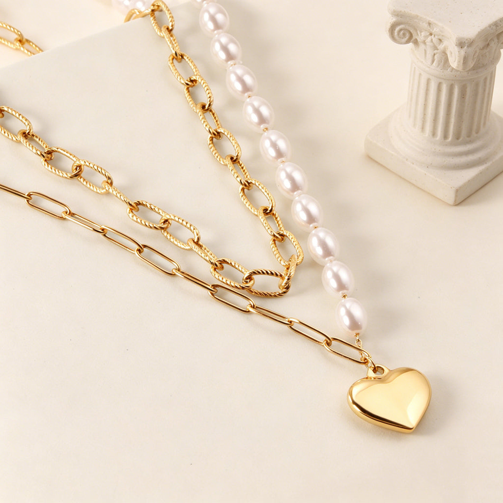 Damen Halskette mit mehrlagigem Design aus Edelstahl und goldplattiertem Herzanhänger Shop Nory