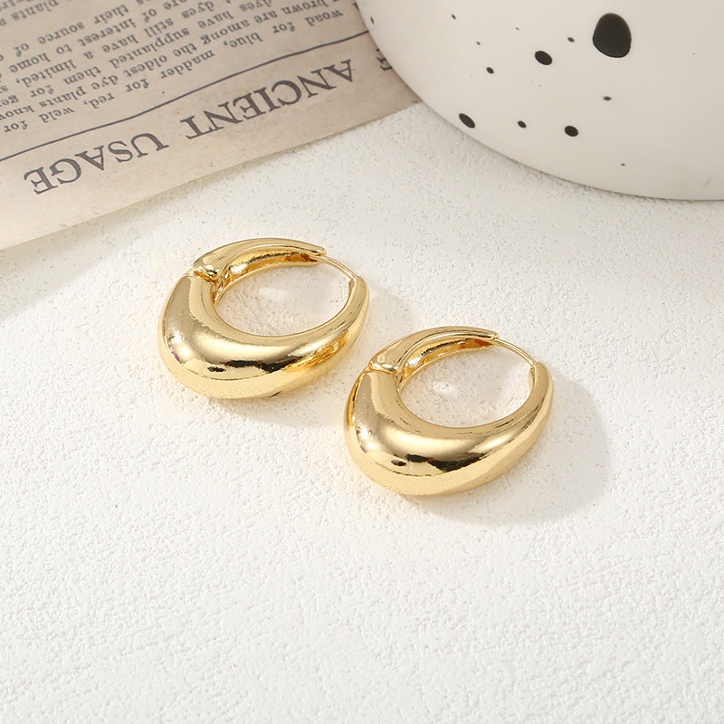 Damen Creolen mit elegantem geschwungenen Design Shop Nory