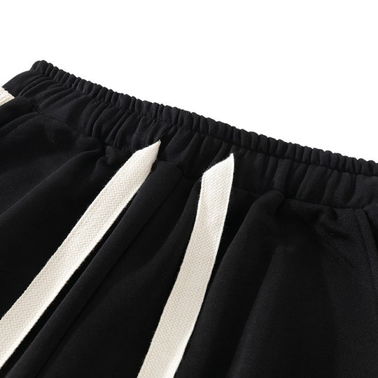Herren Entspannte Jogginghose mit Seitensaum‑Kontraststreifen, elastischem Bund & Kordelzug Shop Nory