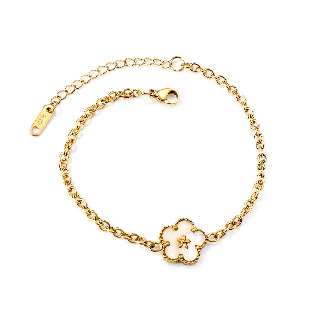Damen Armband mit floralem Anhänger aus hochglanzpoliertem Edelstahl Shop Nory