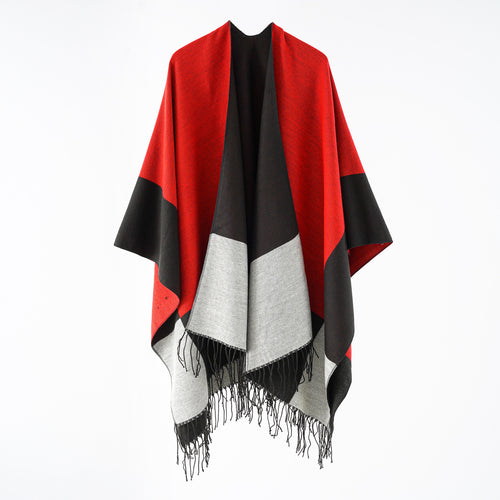 Damen eleganter Wollmix-Capeponcho mit grafischem Blockmuster und Fransen Shop Nory