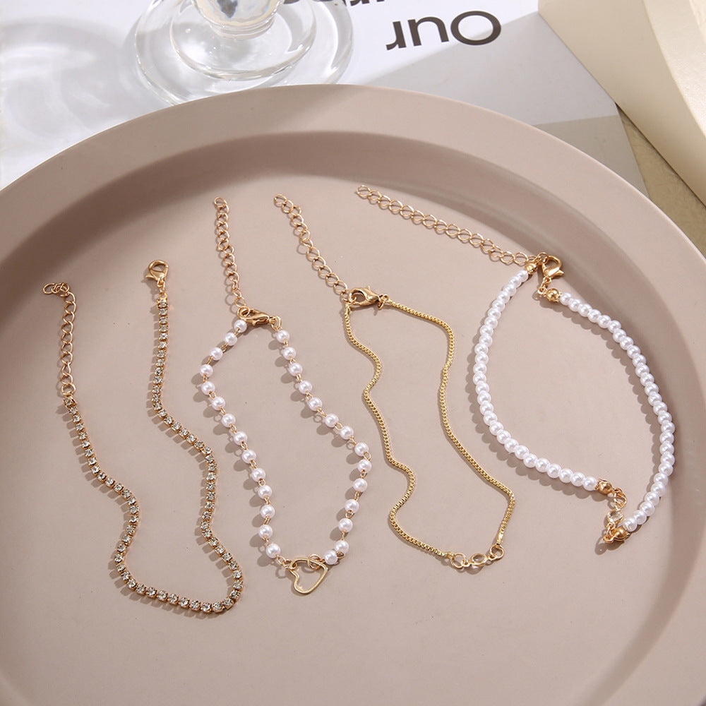Damen Armband-Set mit eleganten Perlen- und Kristallakzenten Shop Nory