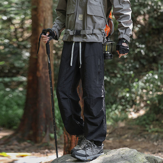 Herren Leichte technische Cargo‑Trekkinghose mit Kordelbund, Reißverschlusstaschen und elastischem Saum Shop Nory