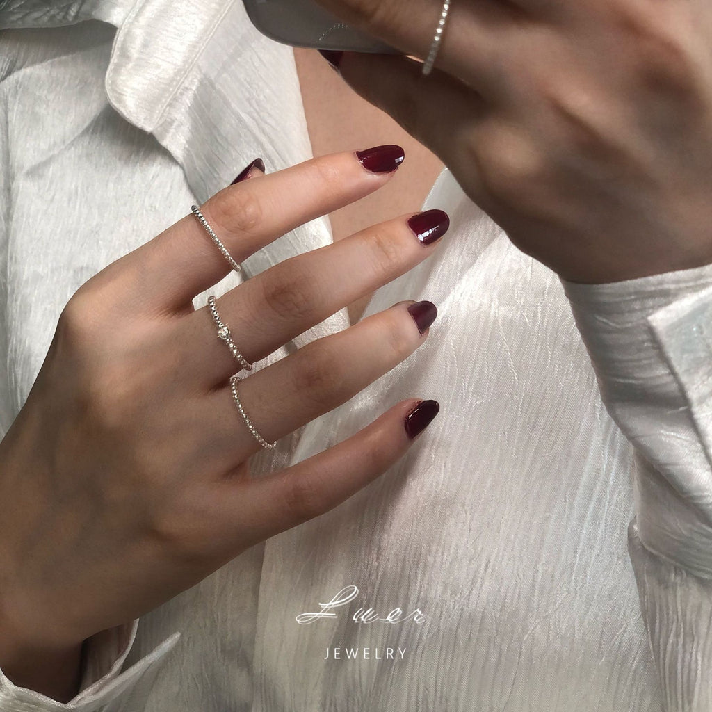 Damen schicker minimalistischer Ring mit zarten Perlenakzenten Shop Nory