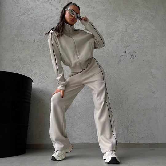 Damen lässiges Sweatset mit Stehkragen Reißverschluss gekürzter Jacke und hochtaillierter Schlaghose Shop Nory
