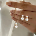 Damen Schmuckset mit eleganten Perlenanhängern und funkelnden Zirkonia Shop Nory
