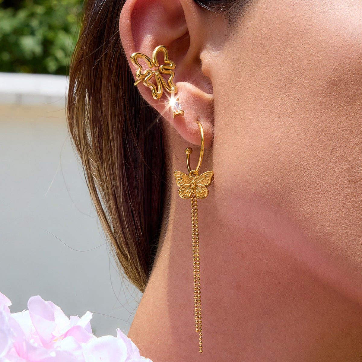 Damen Ohrhänger mit filigranem Schmetterlingsdesign und hängenden Kettendetails Shop Nory
