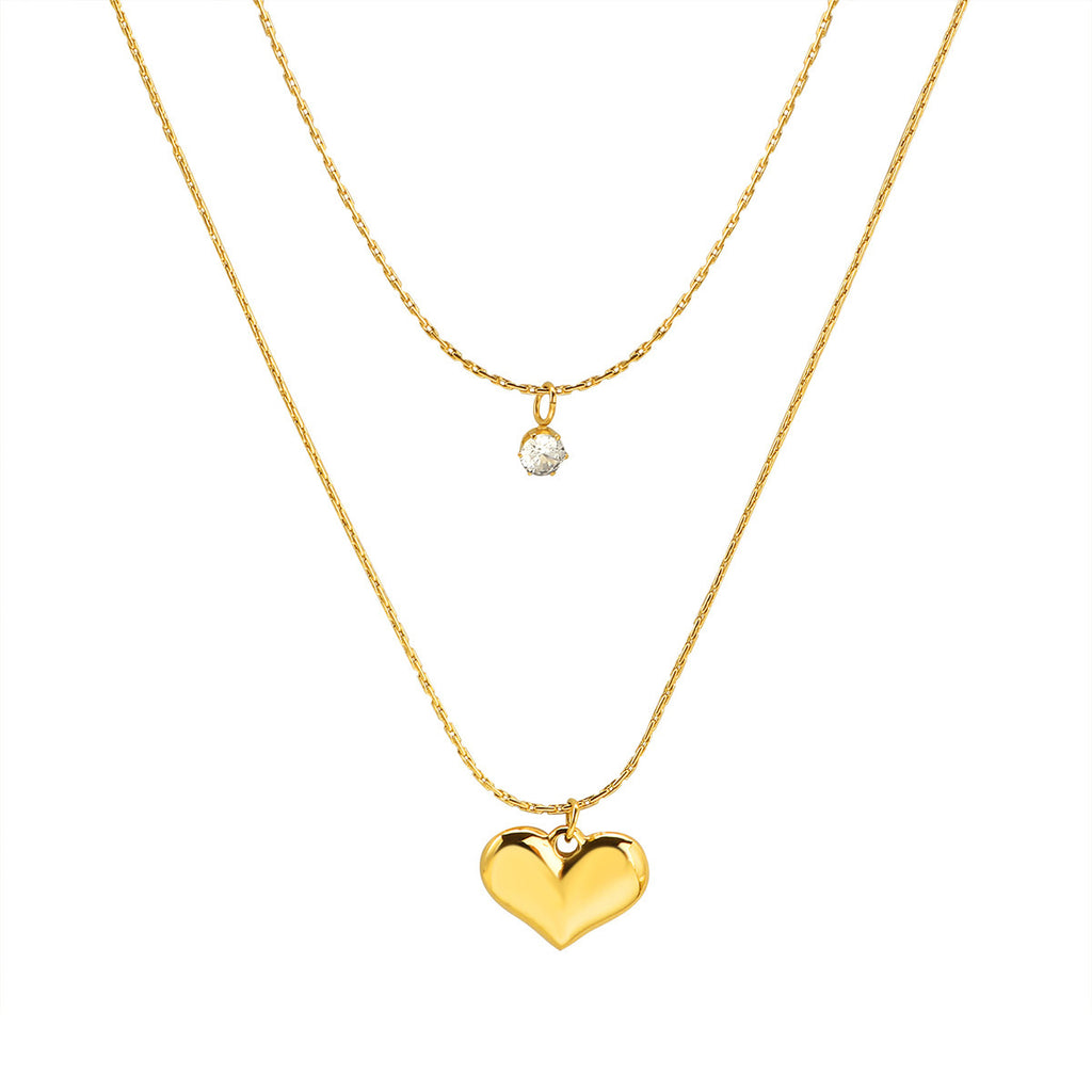 Damen Halskette mit funkelndem Herzanhänger und elegantem Zierdesign Shop Nory