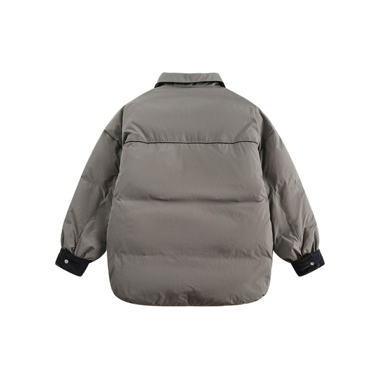 Unisex Kurz geschnittene gesteppte Blousonjacke mit Hemdkragen und Cordbündchen Shop Nory