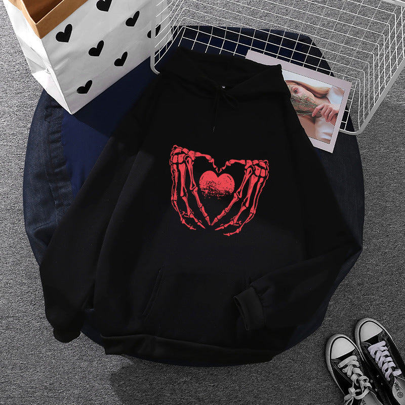 Damen nan stylischer Kapuzenpullover mit Skeletthand Herzmotiv und Kängurutasche Shop Nory