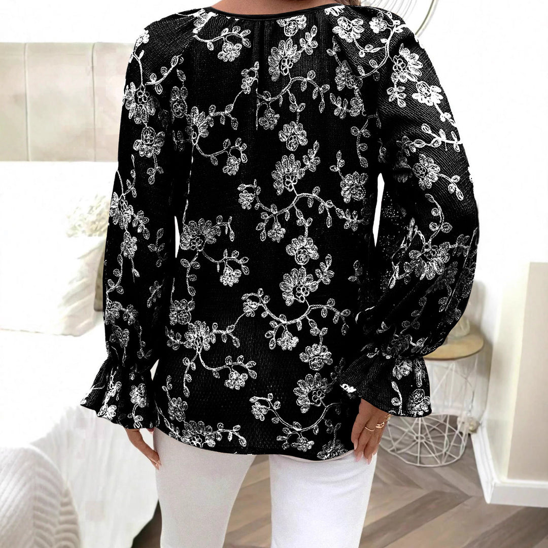 Damen V‑Neck Bluse mit floraler Stickerei, Perlenknopfleiste und Ballonärmeln Shop Nory