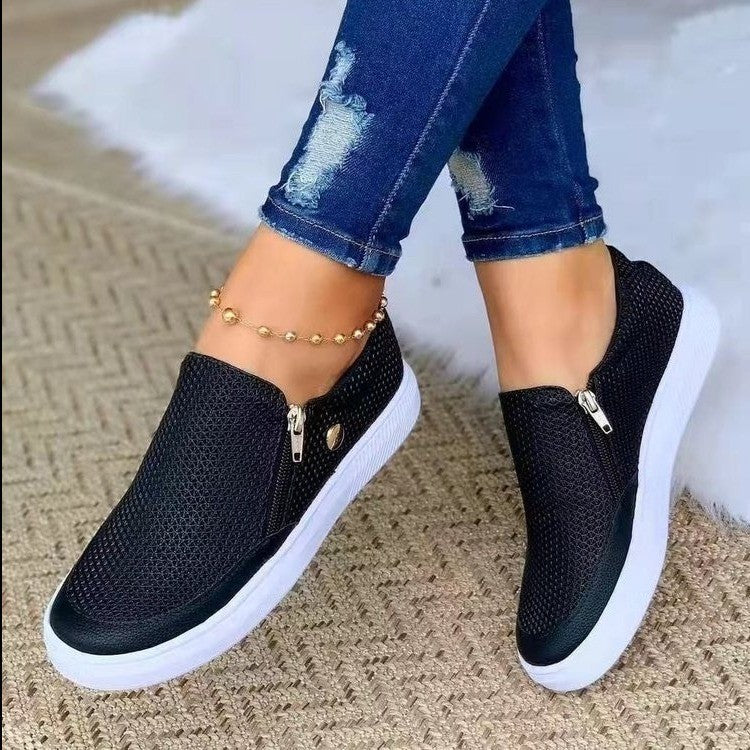 Damen Slip-On Sneakers mit seitlichem Reißverschluss und atmungsaktiver Textur